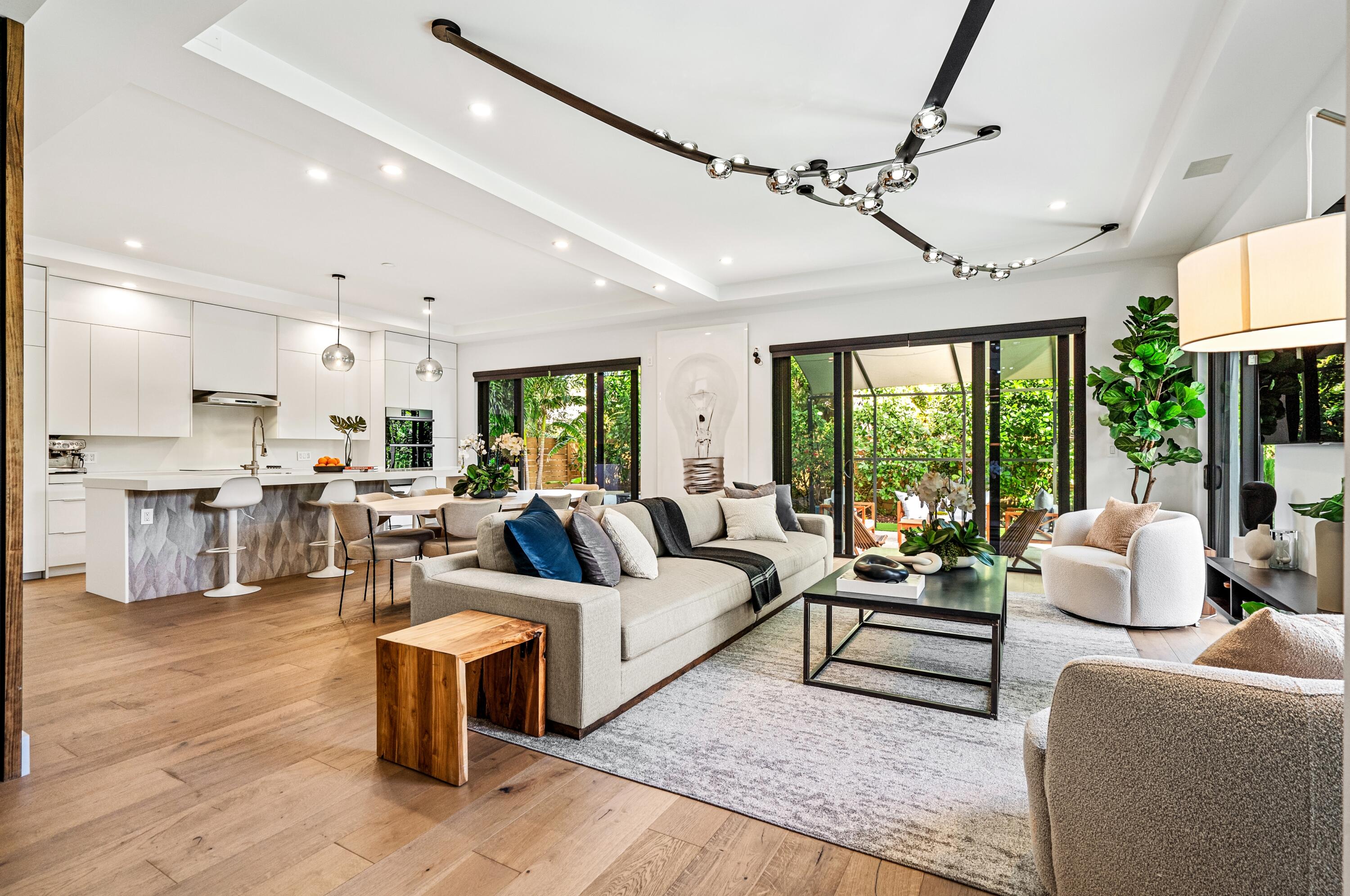 709 Northwest 6th Drive Boca Raton, FL 33486 - Photo 5 of 45 a living room with furniture and a large window