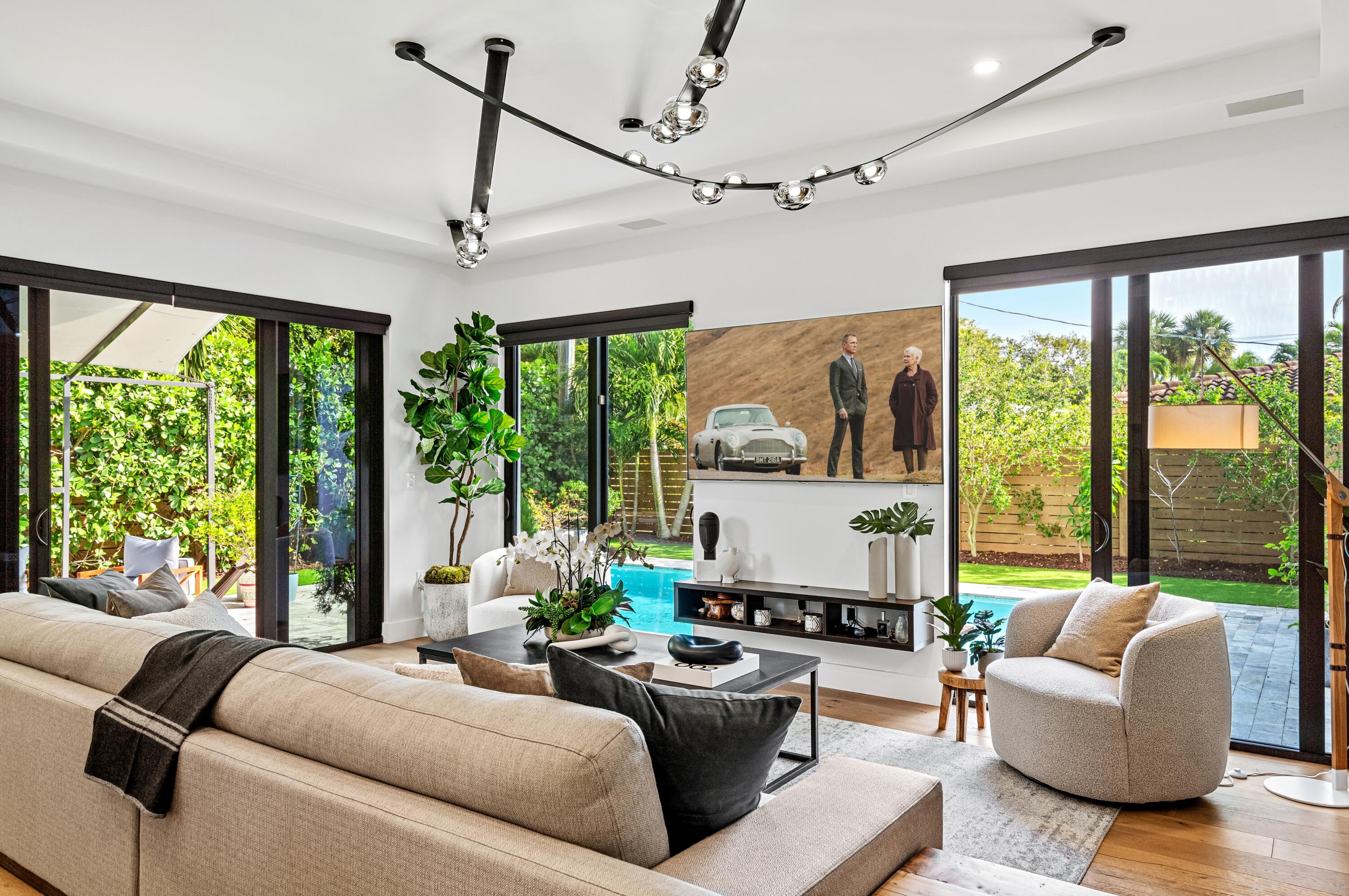 709 Northwest 6th Drive Boca Raton, FL 33486 - Photo 7 of 45 a living room with furniture and a large window