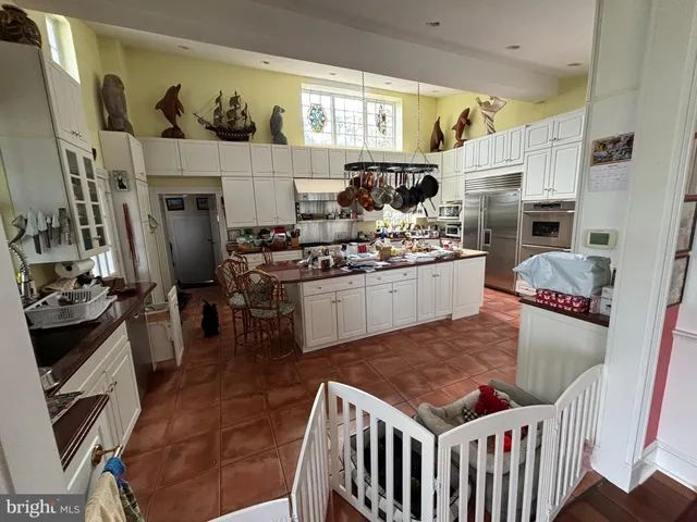 a view of a swimming pool with an outdoor space and seating area