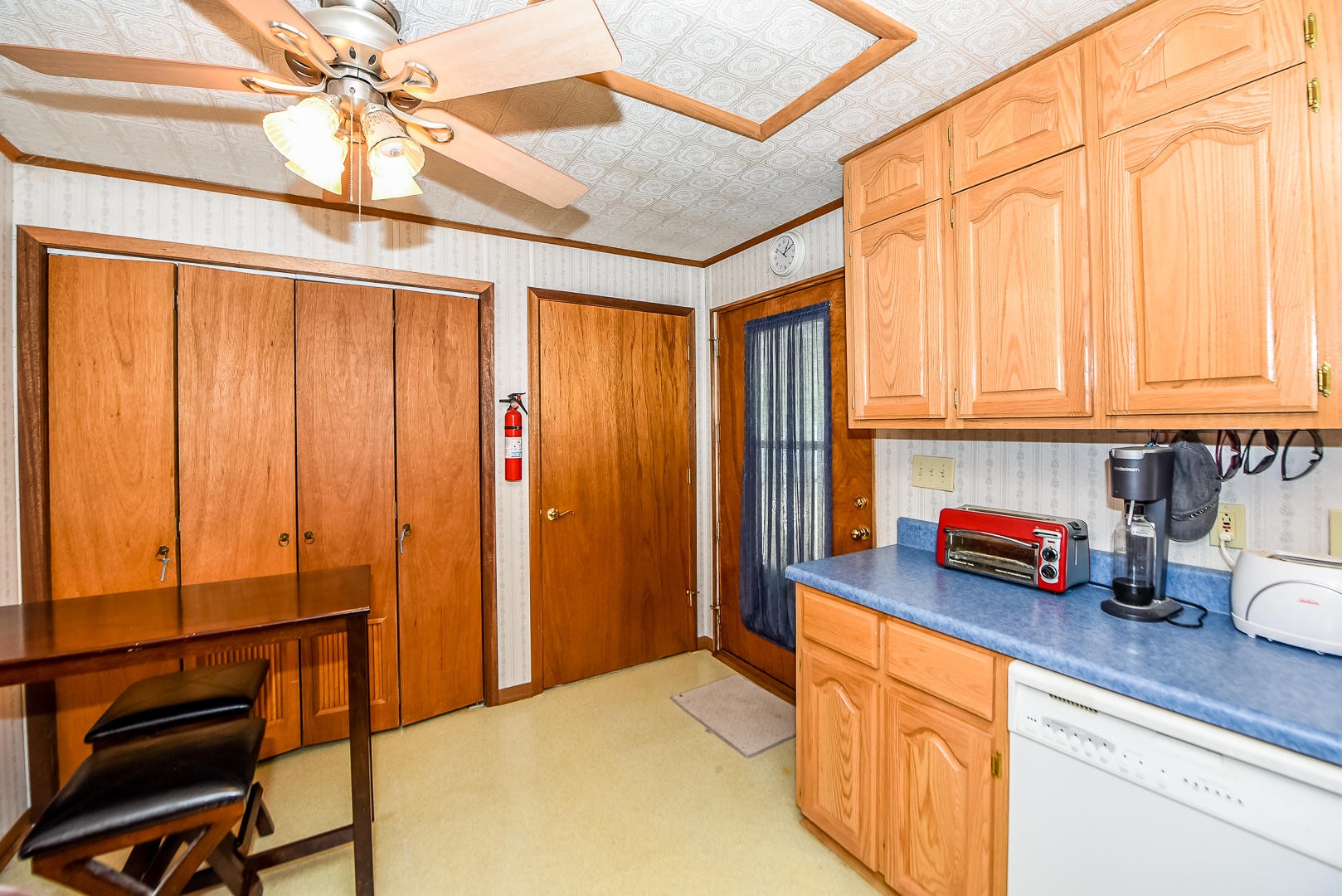 104 East Price Road Oak Ridge, TN 37830 - Photo 5 of 16 a kitchen with stainless steel appliances granite countertop a refrigerator a stove and a sink with cabinets