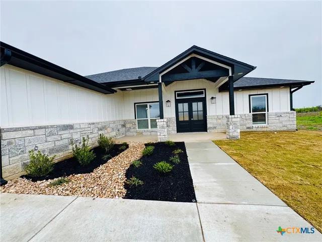 a front view of house with yard