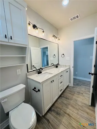 a aerial view of a house having swimming pool