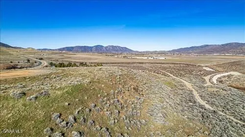 a view of lake with mountain