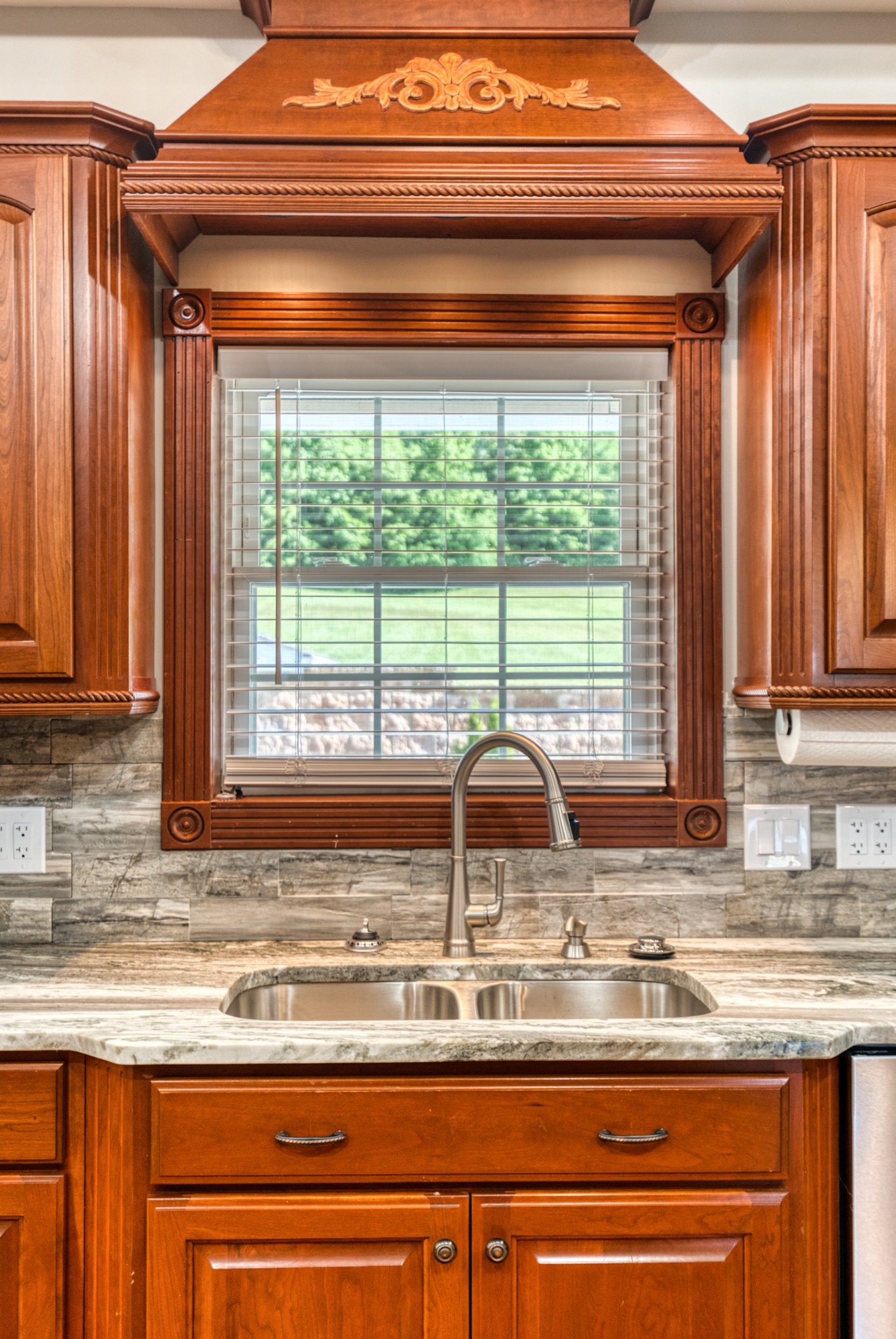315 Blue And Gray Park Road Elkton, KY 42220 - Photo 31 of 66 a kitchen sink with a granite countertop window sink and cabinets