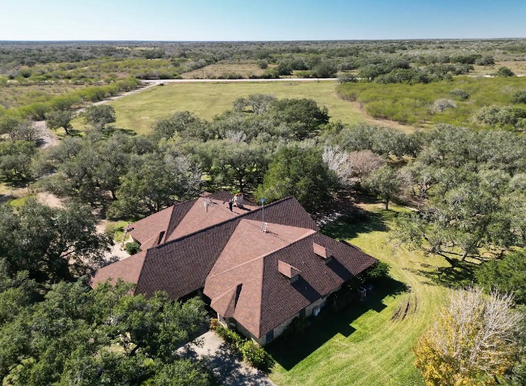784 Highway 183 Highway Refugio, TX 78377 - Photo 2 of 20 an aerial view of a house with a lake view