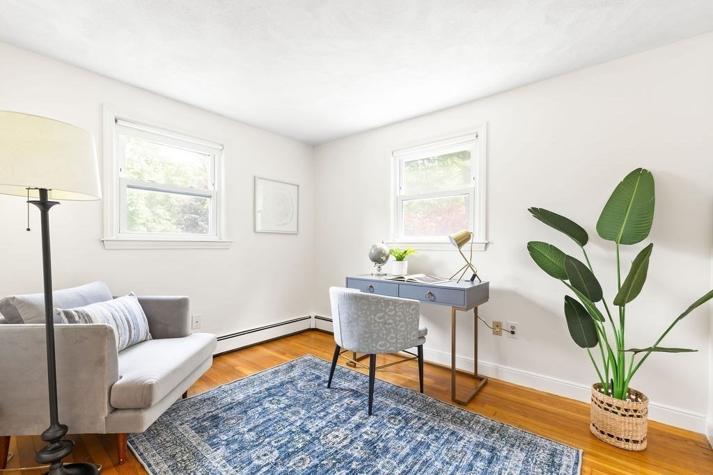 21 Vanderbelt Road Acton, MA 01720 - Photo 21 of 36 a living room with furniture plant and a window