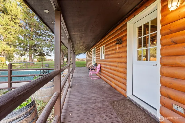 a blue bed sitting in a room next to a window