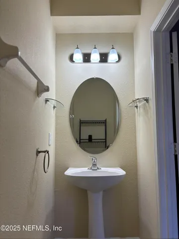 a bathroom with a toilet and a sink