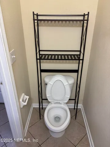 a kitchen with a stove a sink and a refrigerator