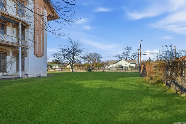 a view of a house with a snow in the yard
