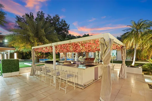 a view of a patio with swimming pool