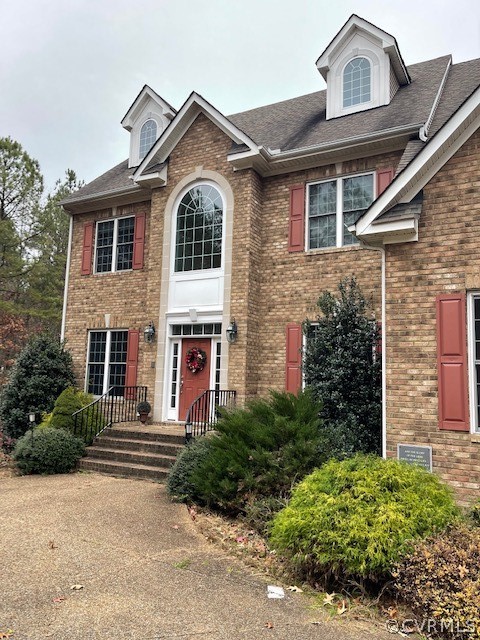 16647 Brattice Mill Road Chesterfield, VA 23838 - Photo 2 of 17 a front view of a house with a yard