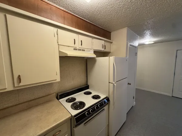 a utility room with washer and dryer