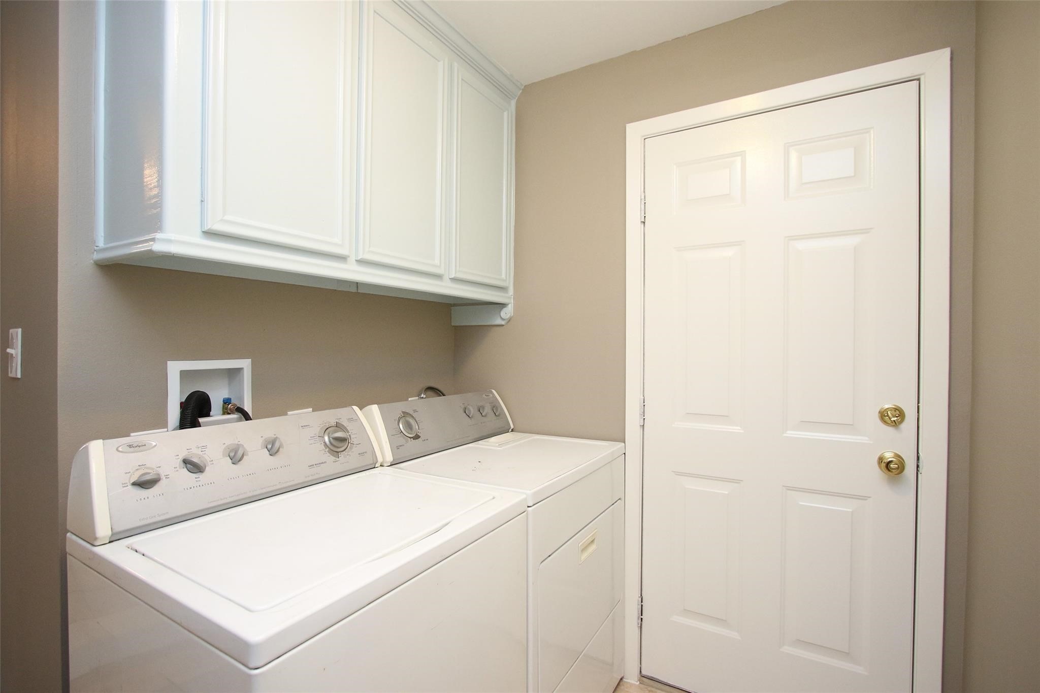 1127 Walling Street Houston, TX 77009 - Photo 22 of 23 a utility room with dryer and washer