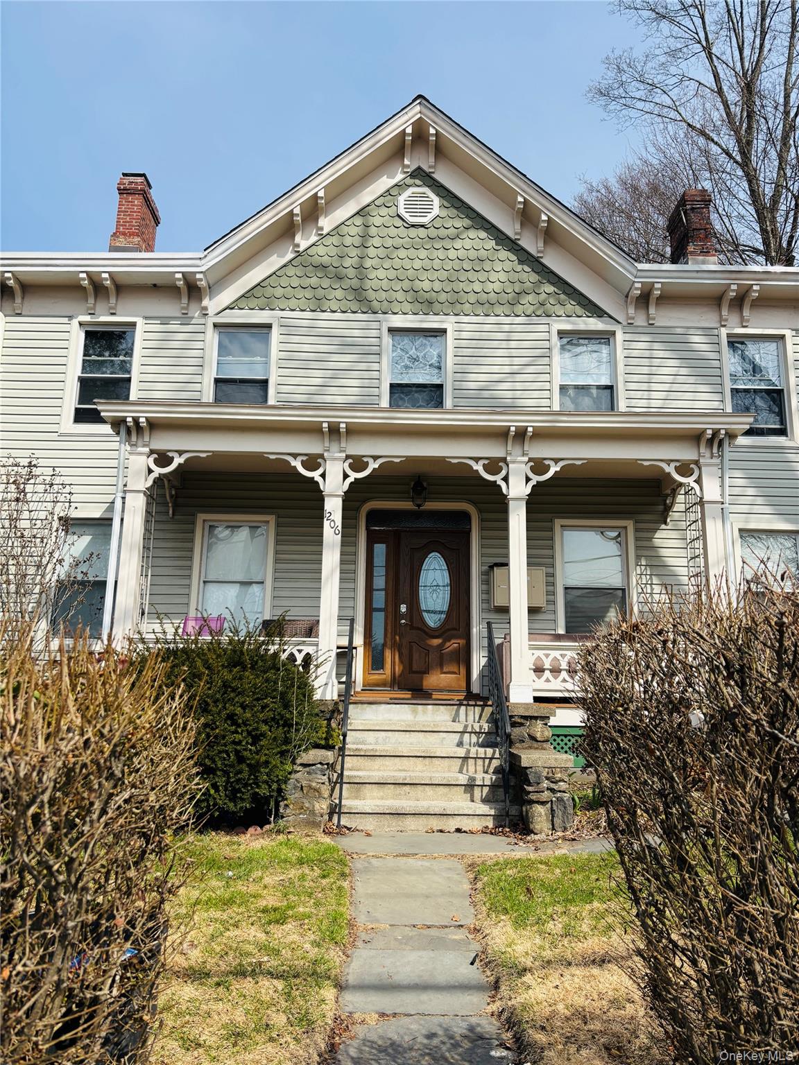 Lovely Victorian style quadruplex. New siding and roof