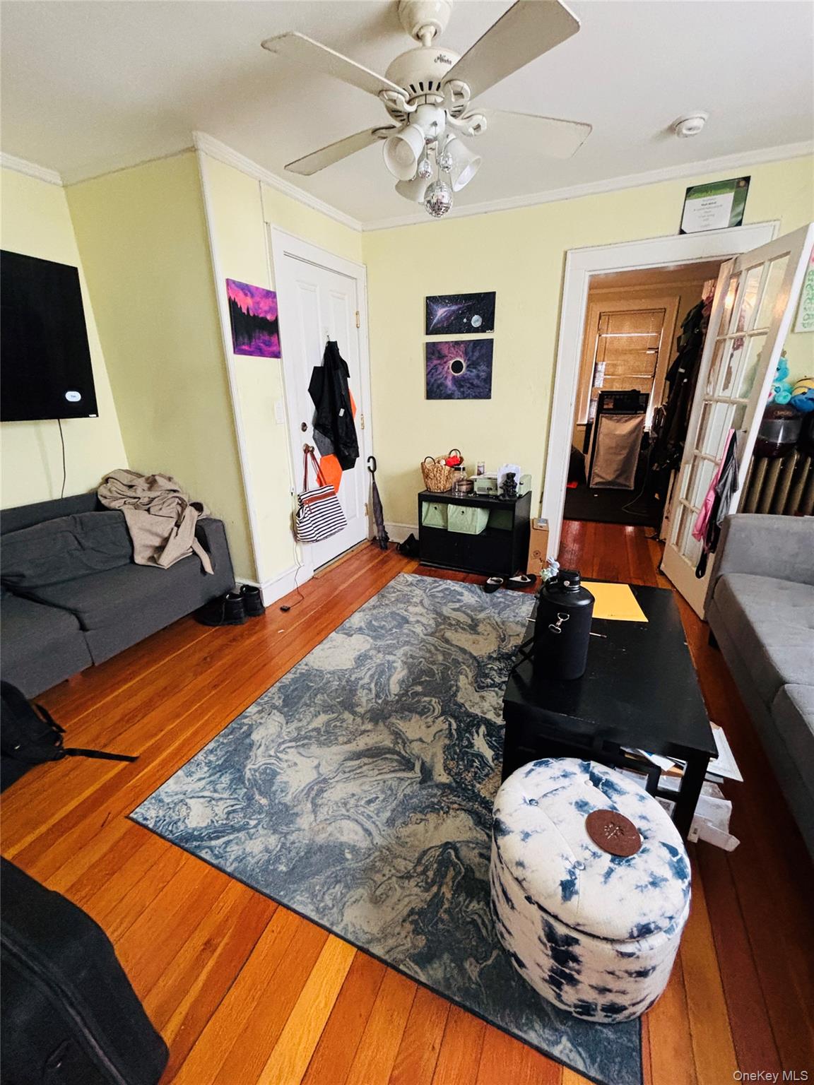 1206 Main Street Peekskill, NY 10566 - Photo 27 of 59 a bedroom with bed and a mirror