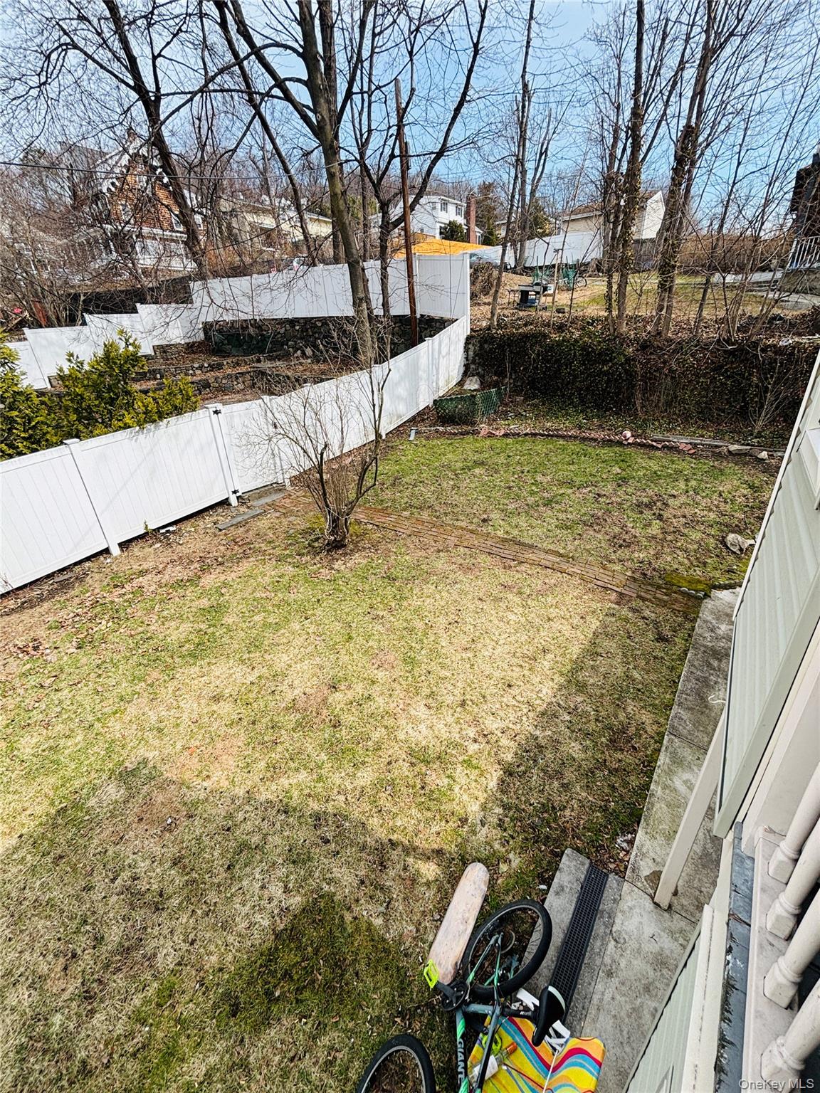 1206 Main Street Peekskill, NY 10566 - Photo 48 of 59 a view of a lake with a bench