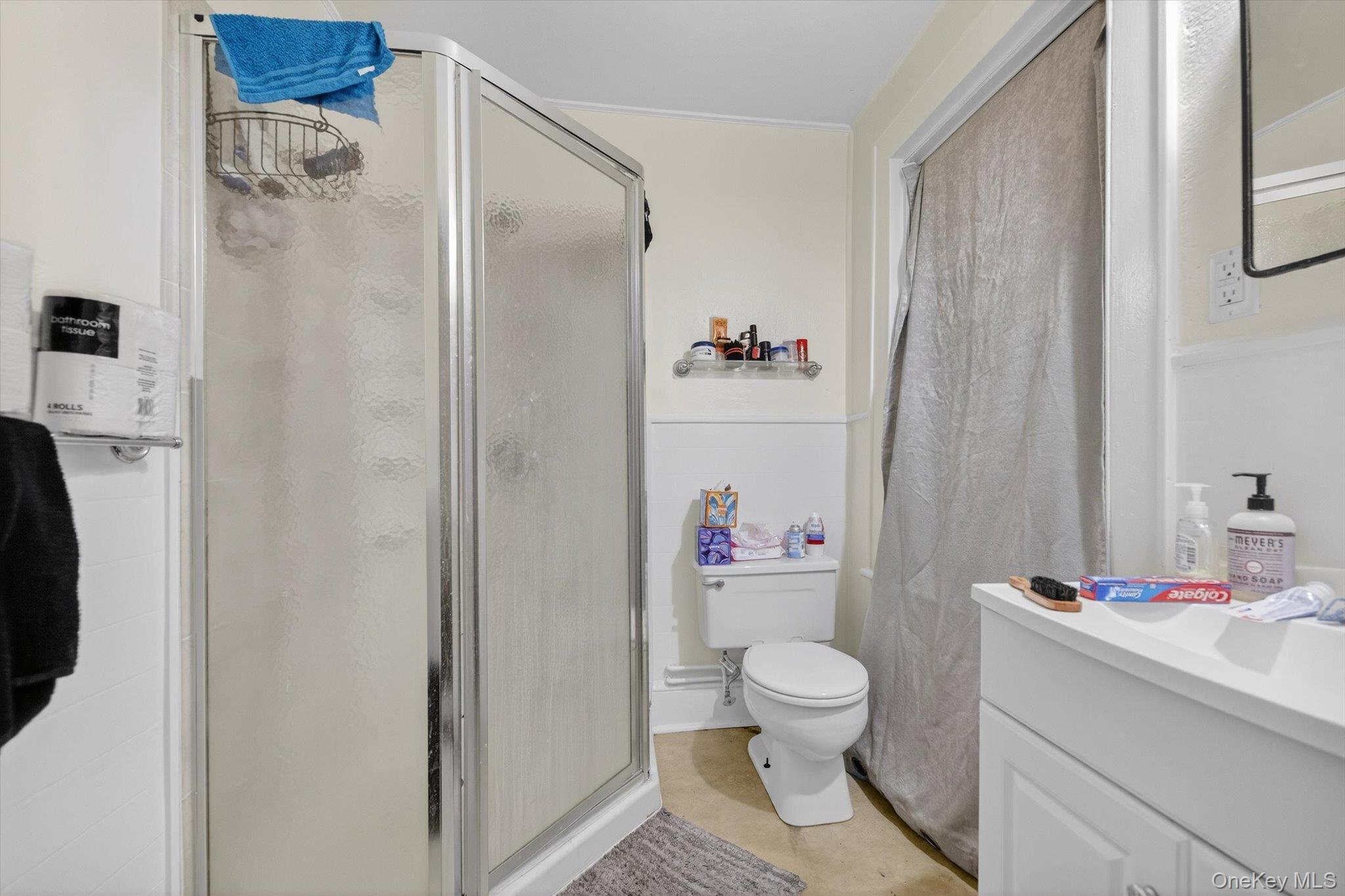 1206 Main Street Peekskill, NY 10566 - Photo 56 of 59 a bathroom with a sink toilet and shower