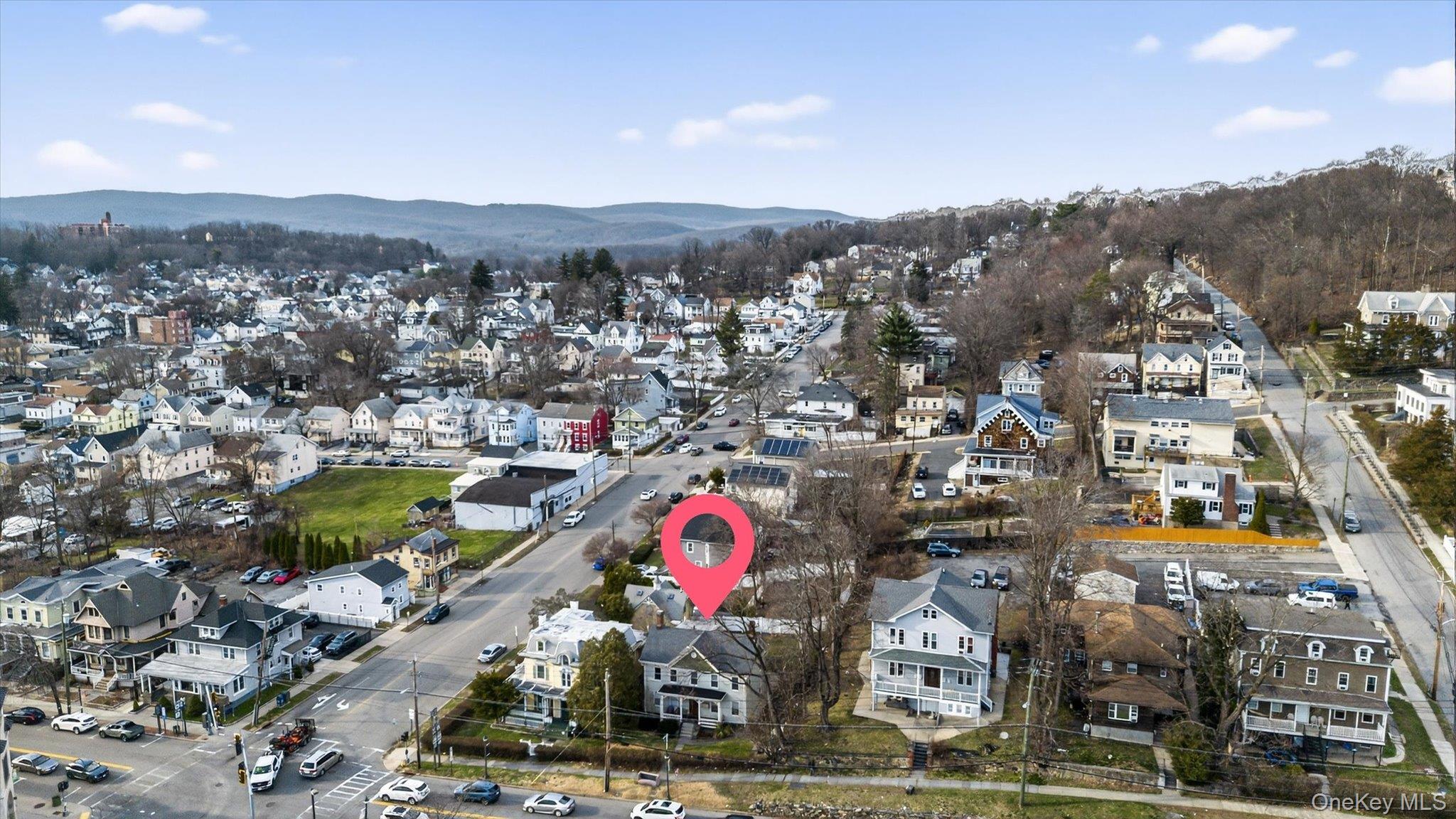 1206 Main Street Peekskill, NY 10566 - Photo 8 of 59 an aerial view of residential houses with outdoor space