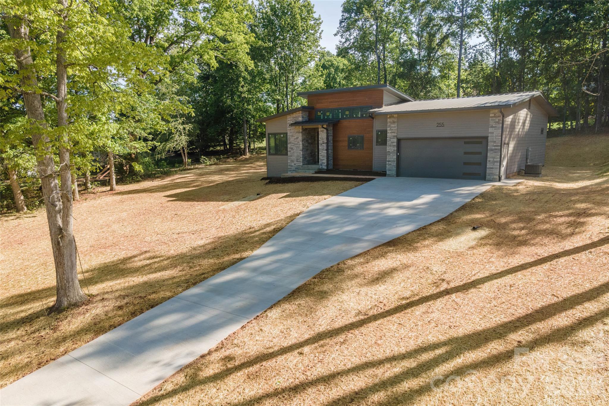 255 Hunters Trace Rutherfordton, NC 28139 - Photo 5 of 19 a view of a house with a yard