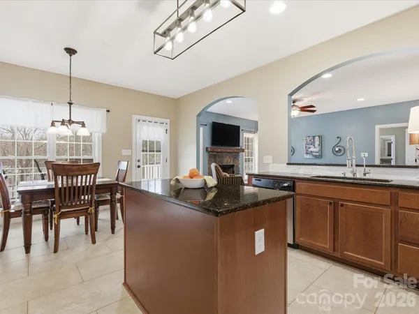 a kitchen with granite countertop lots of counter top space