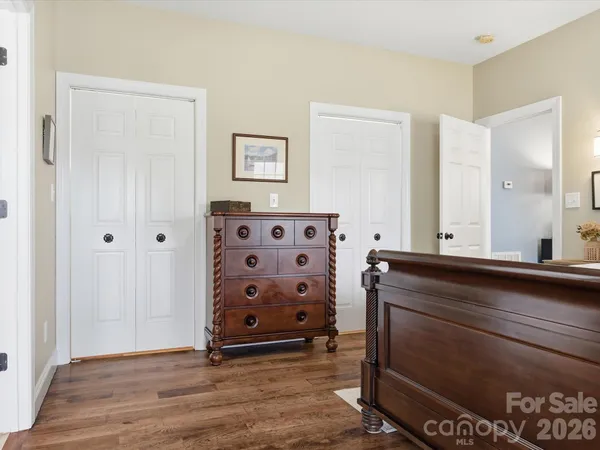 a view of wooden floor and closet