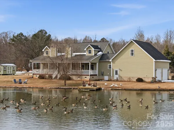 a front view of a house with a boat