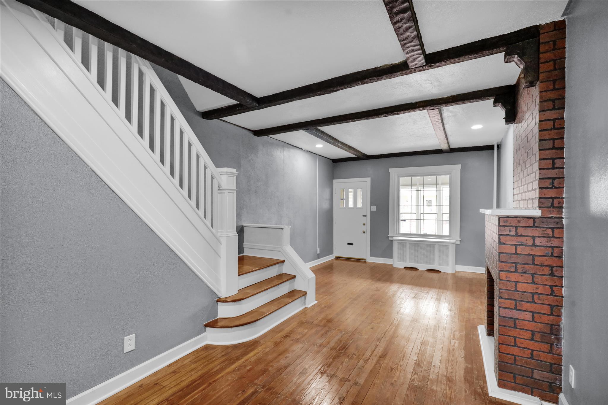 1409 Church Street Reading, PA 19601 - Photo 10 of 23 a view of entryway and hall with wooden floor