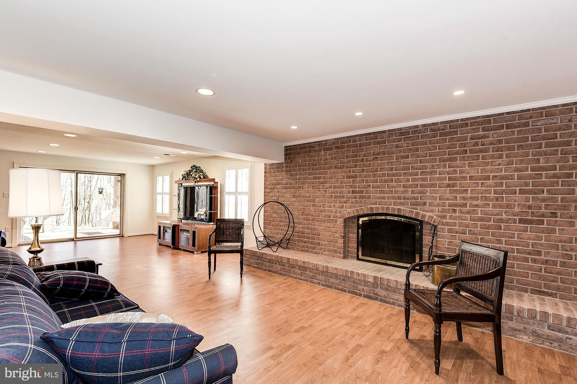 19830 Bucklodge Road Boyds, MD 20841 - Photo 24 of 30 Finished lower level with walk out to brick patio