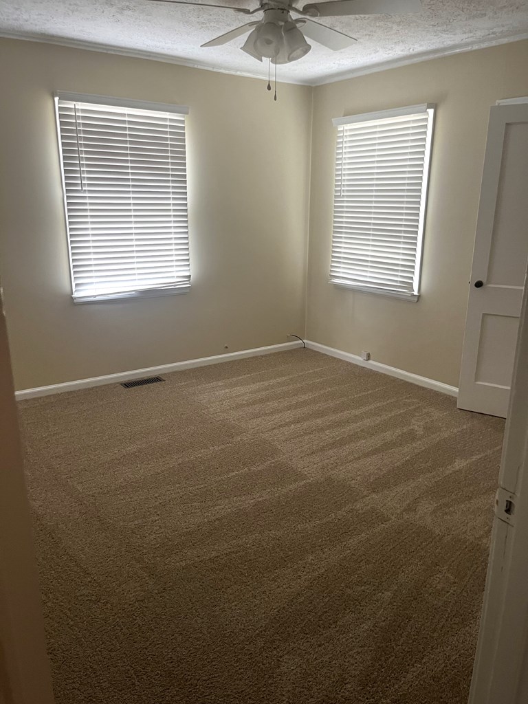 2807 Marion Street Columbus, GA 31906 - Photo 9 of 10 a view of an empty room with a window