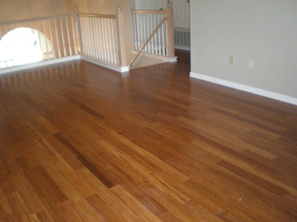 5817 Taylor Draper Cove Austin, TX 78759 - Photo 17 of 28 a view of an empty room with wooden floor