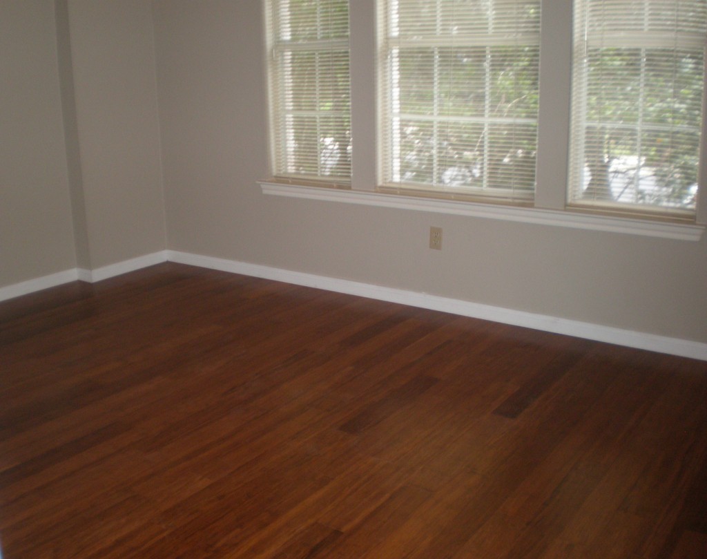 5817 Taylor Draper Cove Austin, TX 78759 - Photo 18 of 28 an empty room with wooden floor and windows