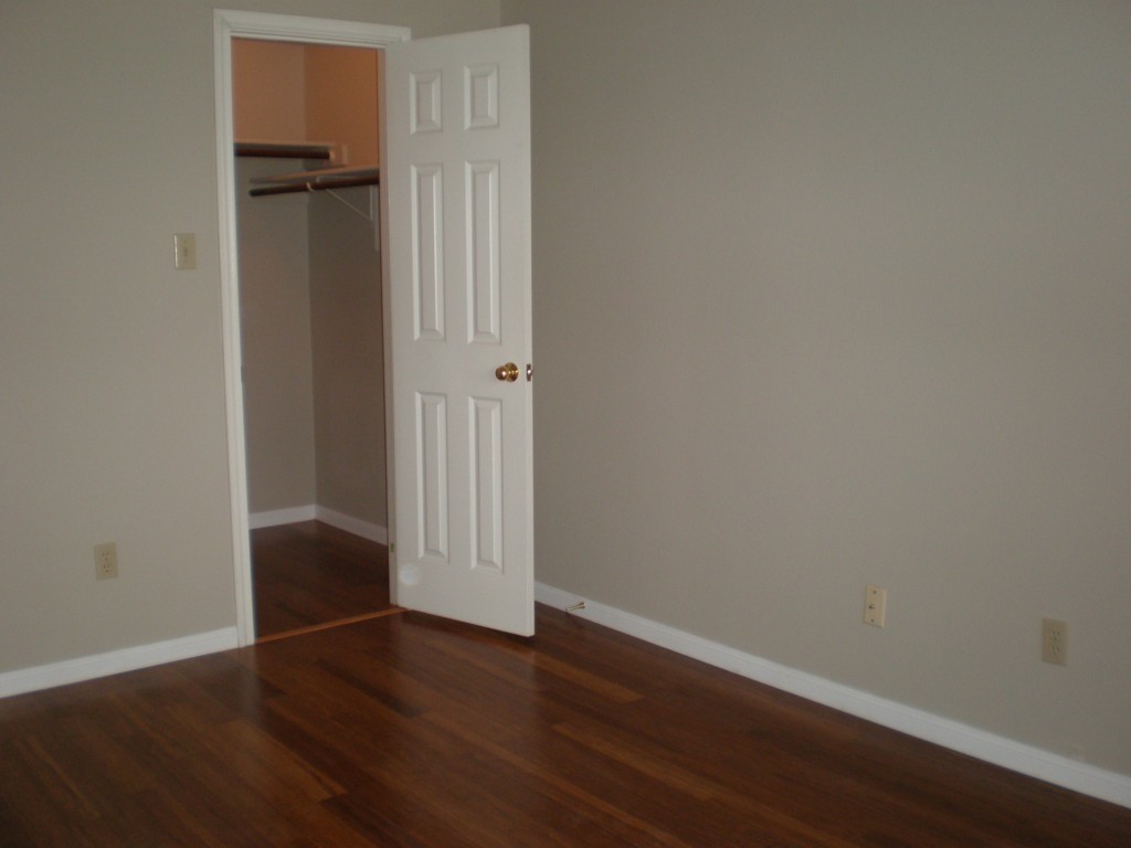 5817 Taylor Draper Cove Austin, TX 78759 - Photo 22 of 28 a view of an empty room with wooden floor