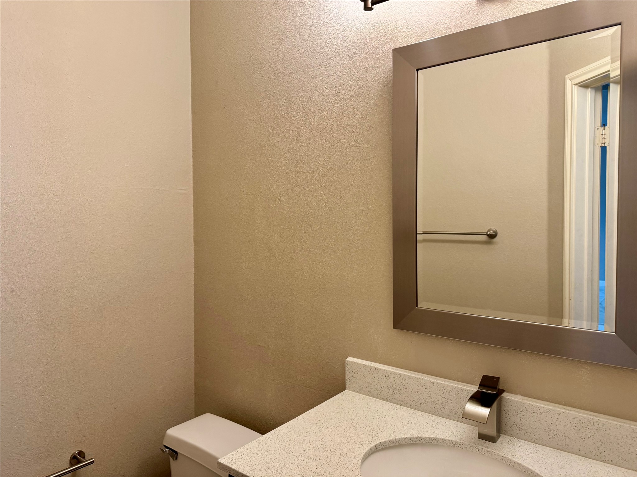 5817 Taylor Draper Cove Austin, TX 78759 - Photo 23 of 28 a bathroom with a sink and a mirror