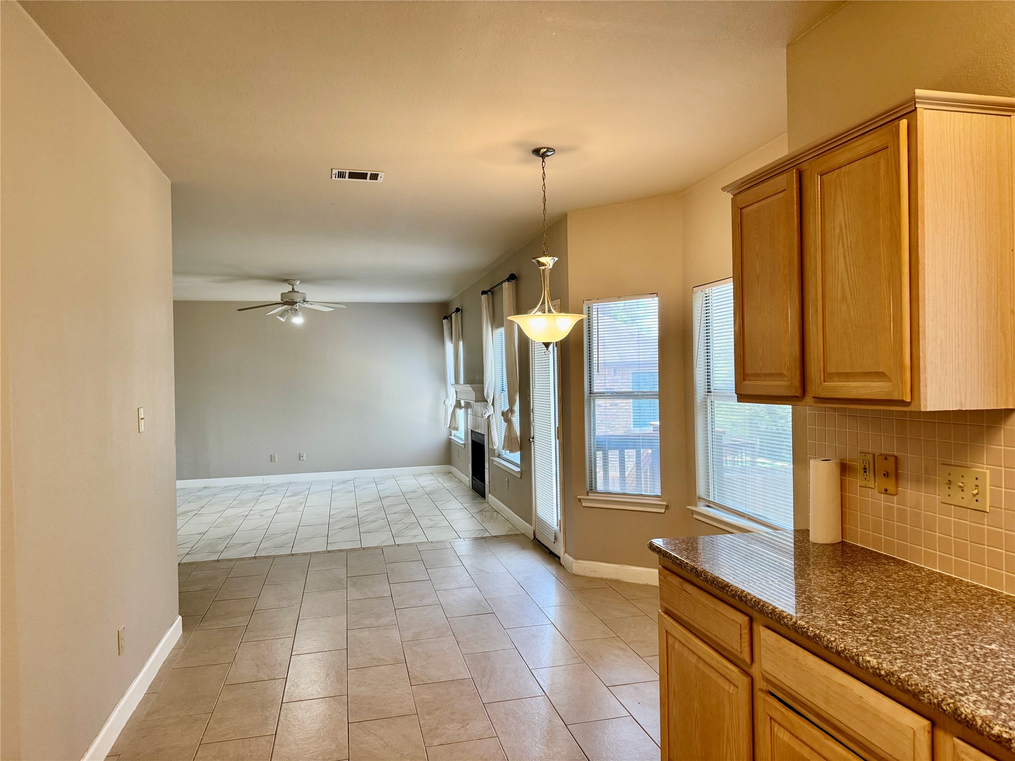 5817 Taylor Draper Cove Austin, TX 78759 - Photo 5 of 28 a bathroom with a granite countertop sink and a shower