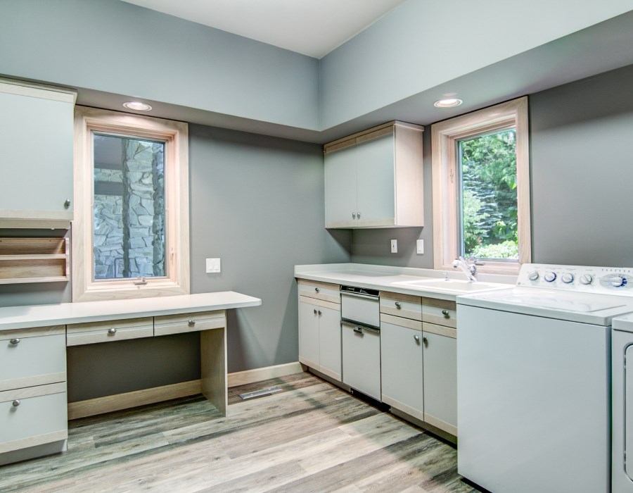 2774 Spring Creek Road Rockford, IL 61107 - Photo 12 of 25 a kitchen with a stove and a sink