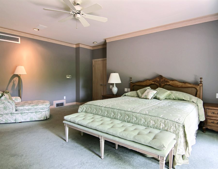 2774 Spring Creek Road Rockford, IL 61107 - Photo 13 of 25 a bedroom with a bed and ceiling fan