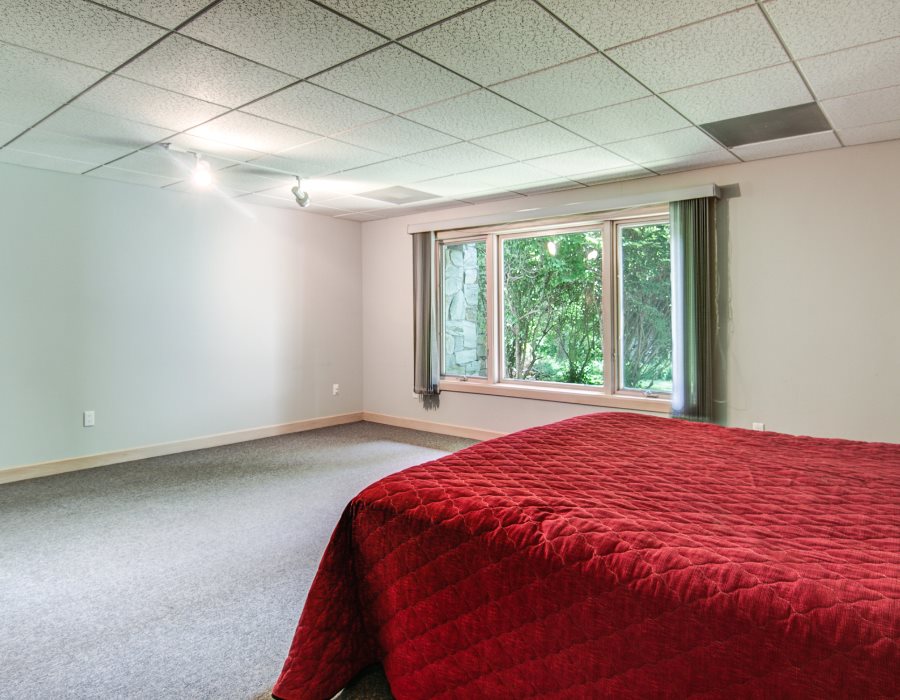 2774 Spring Creek Road Rockford, IL 61107 - Photo 19 of 25 a bedroom with a bed and a window