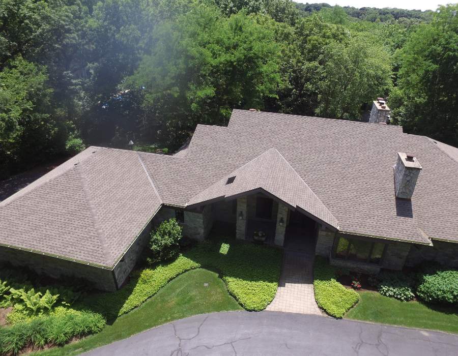 2774 Spring Creek Road Rockford, IL 61107 - Photo 3 of 25 an aerial view of a house with a yard and a garage