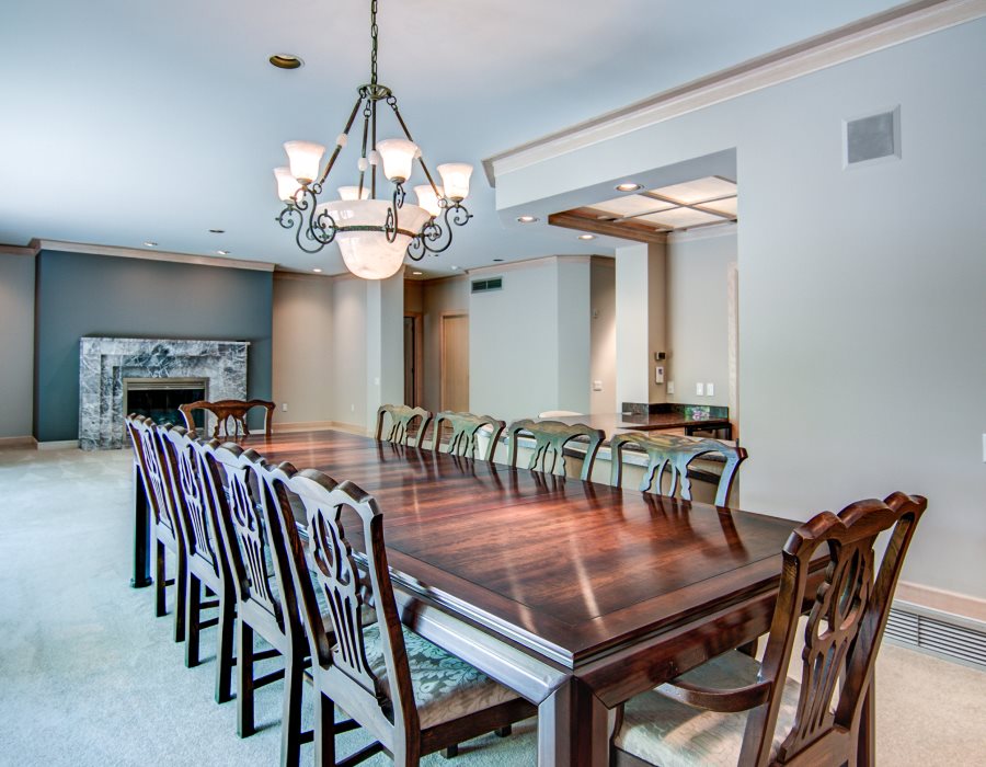 2774 Spring Creek Road Rockford, IL 61107 - Photo 7 of 25 a dining room with furniture a chandelier and window