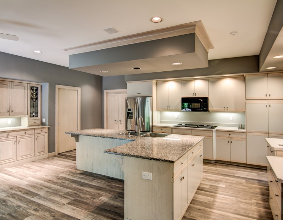 2774 Spring Creek Road Rockford, IL 61107 - Photo 9 of 25 a kitchen with stainless steel appliances granite countertop a sink and a stove