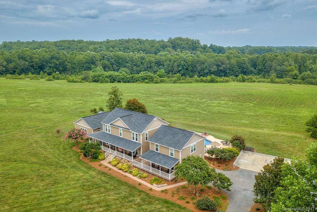 3575 Landrum Road Columbus, NC 28722 - Photo 14 of 24 a view of a lake with a yard