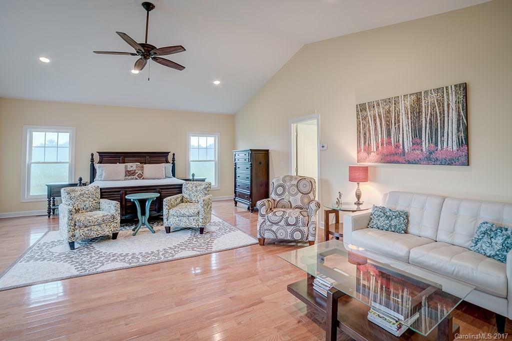 3575 Landrum Road Columbus, NC 28722 - Photo 8 of 24 a living room with furniture and a flat screen tv