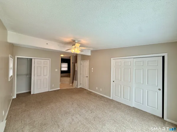 an empty room with a bathroom