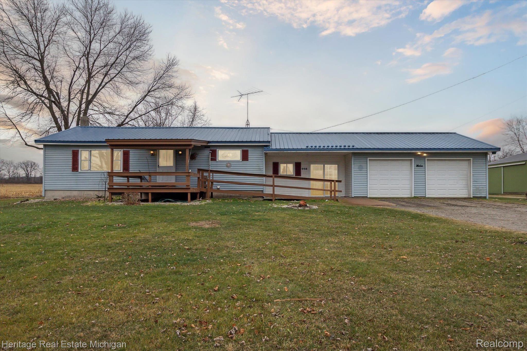 998 Lansing Road Morrice, MI 48857 - Photo 1 of 47 Front of Home