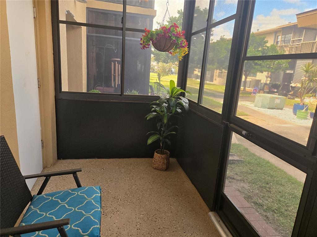 5925 Terrace Park Drive North, Unit 106 St. Petersburg, FL 33709 - Photo 18 of 22 a view of a balcony