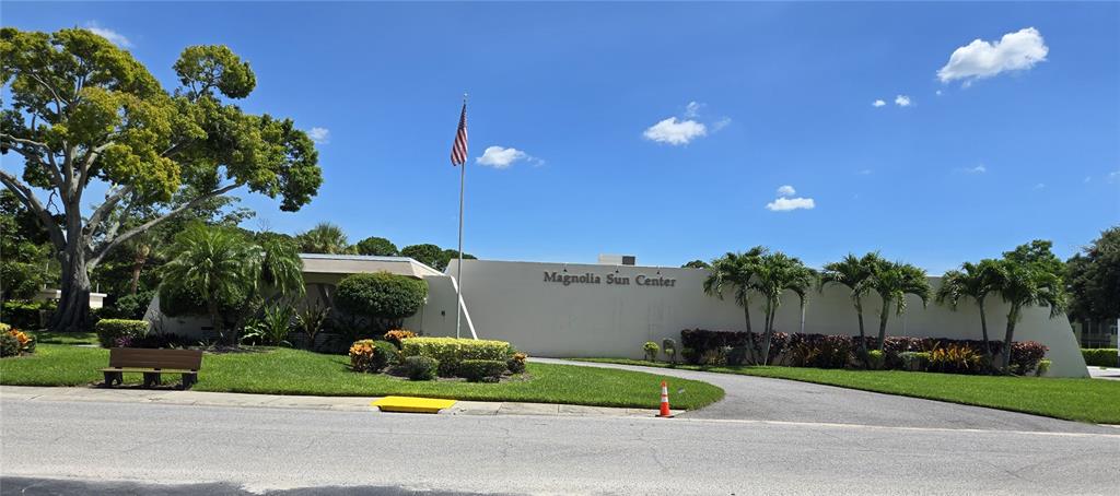 5925 Terrace Park Drive North, Unit 106 St. Petersburg, FL 33709 - Photo 20 of 22 a view of yard with green space