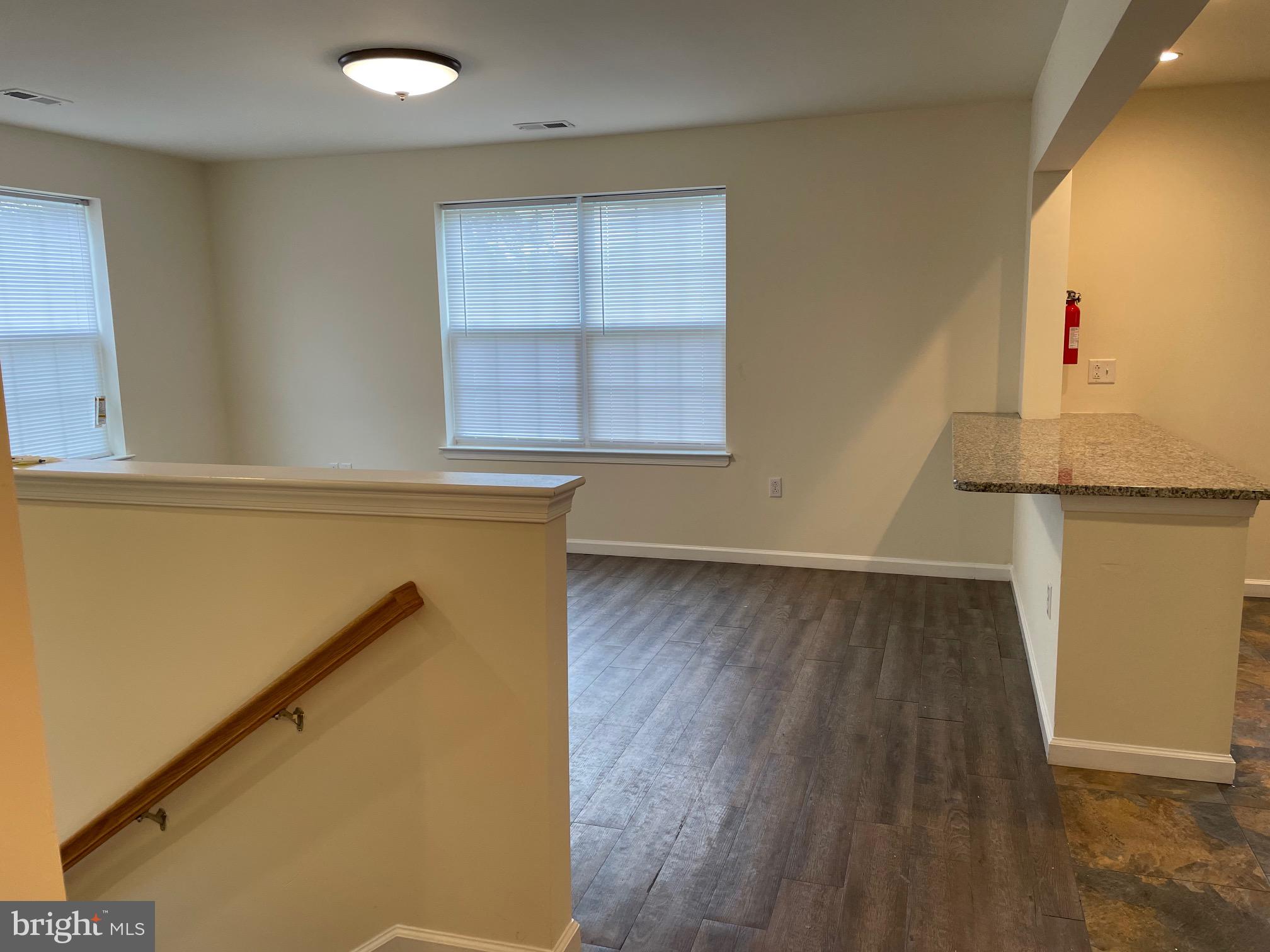 5 Union Street Glassboro, NJ 08028 - Photo 14 of 20 a view of a room with wooden floor and cabinet