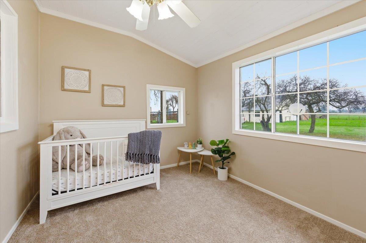 320 West Wise Road Lincoln, CA 95648 - Photo 14 of 28 a bedroom with a bed and a window