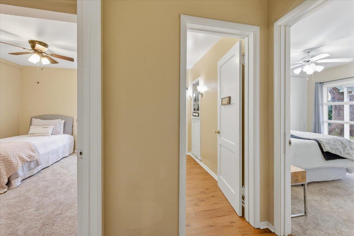 320 West Wise Road Lincoln, CA 95648 - Photo 8 of 28 a view of a hallway with a closet and a mirror
